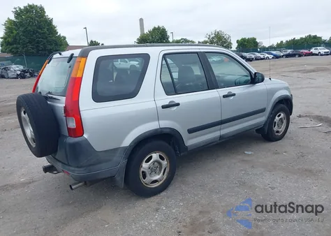 2004 Honda Cr-V Lx z USA, uszkodzony, nr VIN SHSRD78564U235541
